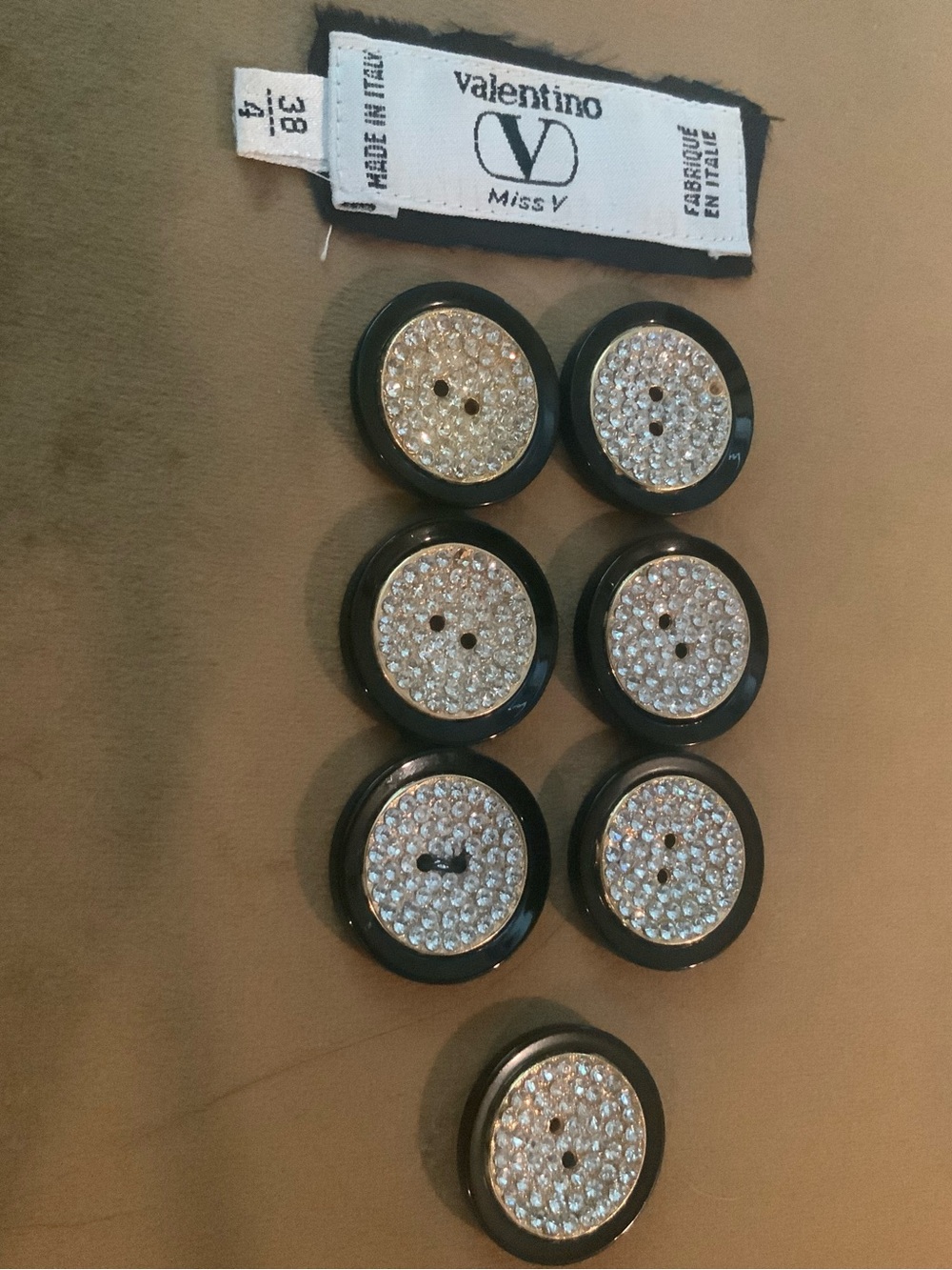 Vintage Valentino rhinestone buttons.